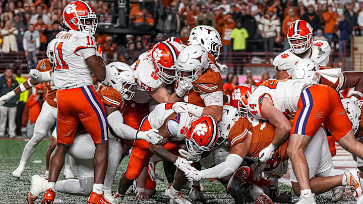 Clemson running back Keith Adams Jr. (19) is stopped on 4th and goal late in the fourth quarter of the game against the Texas Longhorns in the first round of the College Football Playoffs at Darrell K Royal-Texas Memorial Stadium on Saturday, Dec. 21, 2024. Clemson running back Keith Adams Jr. (19) is stopped on 4th and goal late in the fourth quarter of the game against the Texas Longhorns in the first round of the College Football Playoffs at Darrell K Royal-Texas Memorial Stadium on Saturday, Dec. 21, 2024.