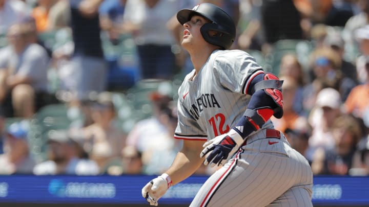 Jul 28, 2024; Detroit, Michigan, USA;  Minnesota Twins third baseman Brooks Lee (72) hits a sacrifice fly to score a run in the second inning against the Detroit Tigers at Comerica Park. Mandatory Credit: Rick Osentoski-USA TODAY Sports