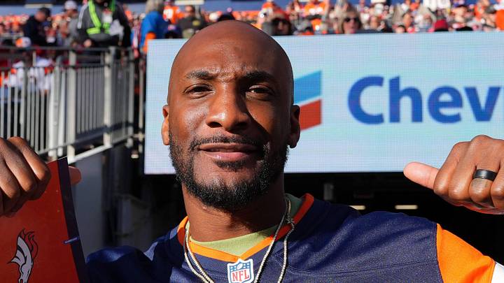 Nov 17, 2024; Denver, Colorado, USA; Retired American football player Aqib Talib during the second quarter between the Atlanta Falcons against the Denver Broncos at Empower Field at Mile High. Mandatory Credit: Ron Chenoy-Imagn Images
