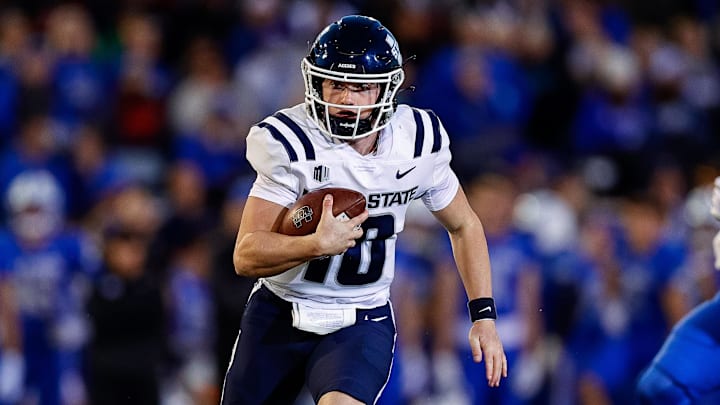 Sep 15, 2023; Colorado Springs, Colorado, USA; Utah State Aggies quarterback McCae Hillstead (10) runs the ball in the second quarter against the Air Force Falcons at Falcon Stadium. Mandatory Credit: Isaiah J. Downing-Imagn Images