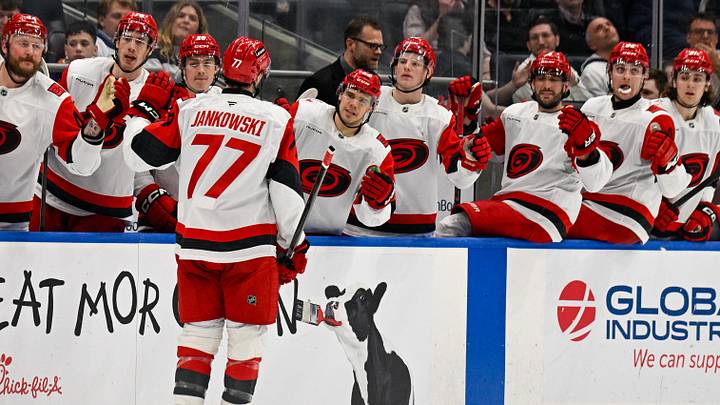 Apr 14, 2026; Elmont, New York, USA;  Carolina Hurricanes left wing Mark Jankowski (77) celebrates his goal against the New York Islanders during the third period at UBS Arena. Mandatory Credit: Dennis Schneidler-Imagn Images