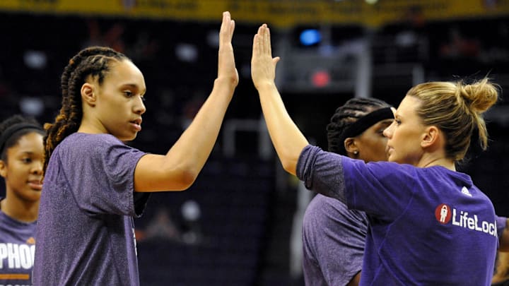 May 27, 2013; Phoenix, AZ, USA; Phoenix Mercury center Brittney Griner (42) and forward Penny Taylor (13) high five before the first half against the Chicago Sky at US Airways Center. The Chicago Sky defeated the Phoenix Mercury 102-80. Mandatory Credit: Casey Sapio-Imagn Images