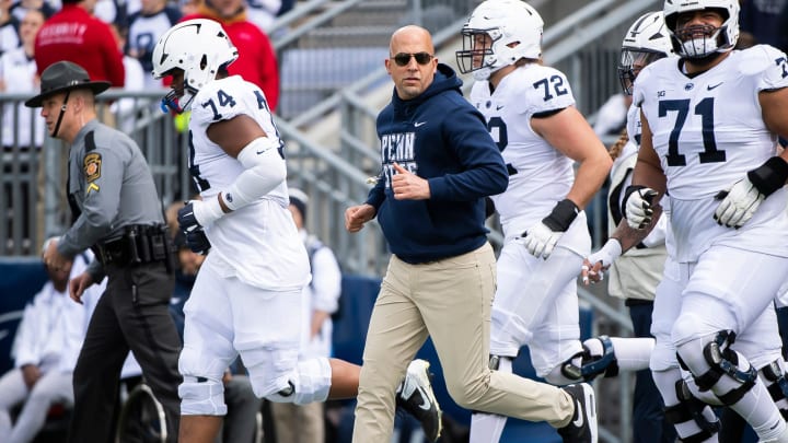 Penn State head coach James Franklin leads the Nittany Lions onto the field for the Blue-White Game.