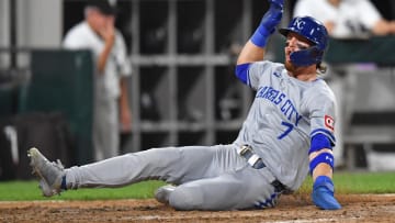 Jul 30, 2024; Chicago, Illinois, USA; Kansas City Royals shortstop Bobby Witt Jr. (7) slides into home plate to score a run during the eighth inning against the Chicago White Sox at Guaranteed Rate Field. Mandatory Credit: Patrick Gorski-USA TODAY Sports