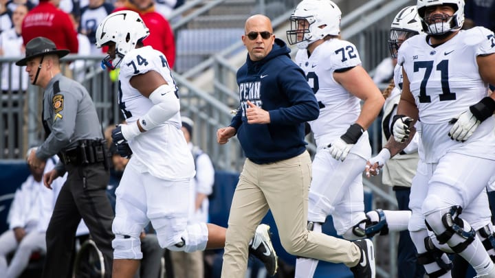 Penn State head coach James Franklin leads the Nittany Lions onto the field at Beaver Stadium for the Blue-White Game. 