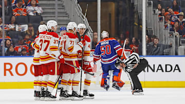 The Calgary Flames celebrate a goal scored by Calgary Flames forward Justin Kirkland (58) during the third period against the Edmonton Oilers