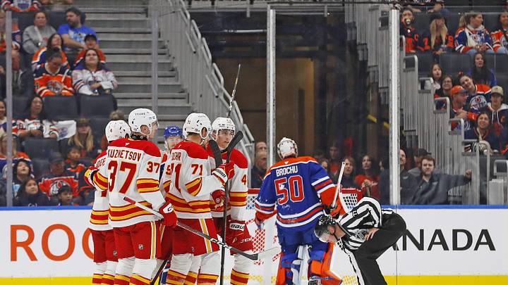 The Calgary Flames celebrate a goal scored by Calgary Flames forward Justin Kirkland (58) during the third period against the Edmonton Oilers