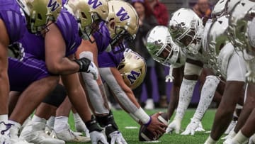 Washington and Oregon line up in last year's game in Seattle.