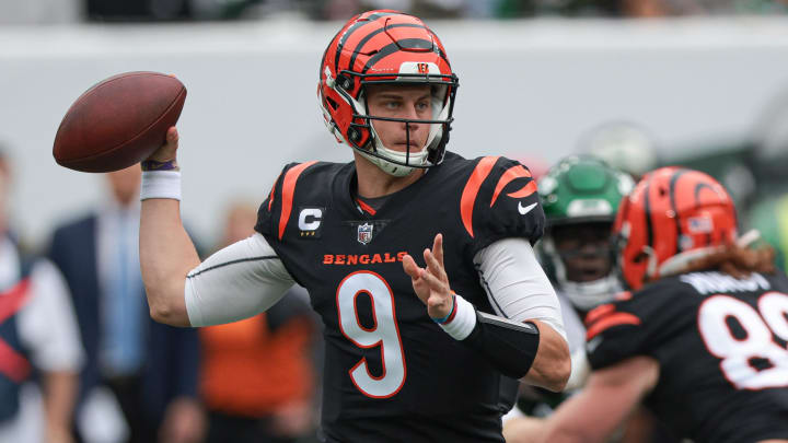 Sep 25, 2022; East Rutherford, New Jersey, USA; Cincinnati Bengals quarterback Joe Burrow (9) throws the ball against the New York Jets during the first half at MetLife Stadium. Mandatory Credit: Vincent Carchietta-USA TODAY Sports