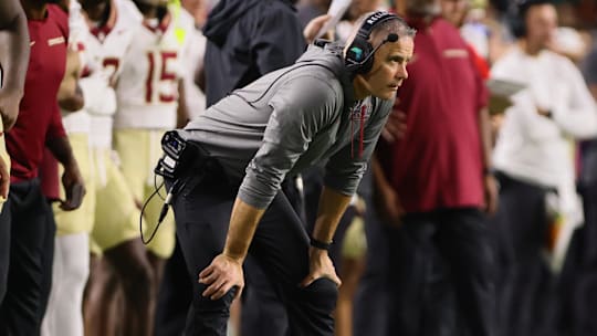 Oct 26, 2024; Miami Gardens, Florida, USA; Florida State Seminoles head coach Mike Norvell watches from the sideline against the Miami Hurricanes during the second quarter at Hard Rock Stadium. Mandatory Credit: Sam Navarro-Imagn Images