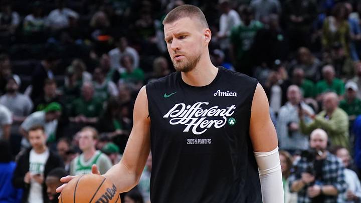 May 7, 2025; Boston, Massachusetts, USA; Boston Celtics center Kristaps Porzingis (8) warms up before the start of game two of the second round for the 2025 NBA Playoffs against the New York Knicks at TD Garden. Mandatory Credit: David Butler II-Imagn Images