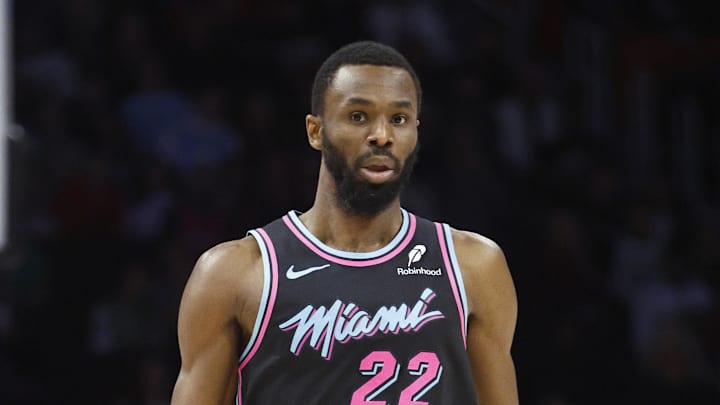Miami Heat forward Andrew Wiggins brings the ball up court