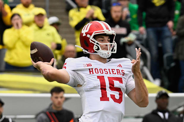 Indiana quarterback Fernando Mendoza throws a pass against Oregon.