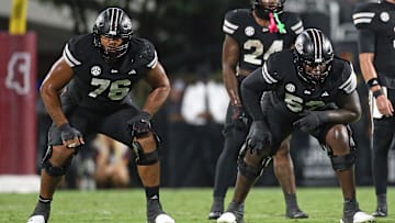 Sep 6, 2025; Starkville, Mississippi, USA; Mississippi State Bulldogs offensive lineman Albert Reese IV (76) and offensive lineman Zack Owens (52) wait for the snap during the second quarter against the Arizona State Sun Devils at Davis Wade Stadium at Scott Field. Mandatory Credit: Petre Thomas-Imagn Images
