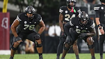 Sep 6, 2025; Starkville, Mississippi, USA; Mississippi State Bulldogs offensive lineman Albert Reese IV (76) and offensive lineman Zack Owens (52) wait for the snap during the second quarter against the Arizona State Sun Devils at Davis Wade Stadium at Scott Field. Mandatory Credit: Petre Thomas-Imagn Images