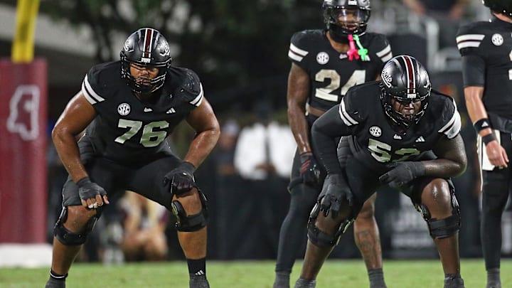 Sep 6, 2025; Starkville, Mississippi, USA; Mississippi State Bulldogs offensive lineman Albert Reese IV (76) and offensive lineman Zack Owens (52) wait for the snap during the second quarter against the Arizona State Sun Devils at Davis Wade Stadium at Scott Field. Mandatory Credit: Petre Thomas-Imagn Images