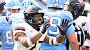 Oct 25, 2025; Chapel Hill, North Carolina, USA; Virginia Cavaliers safety Devin Neal (27) reacts in overtime at Kenan Stadium. Mandatory Credit: Bob Donnan-Imagn Images