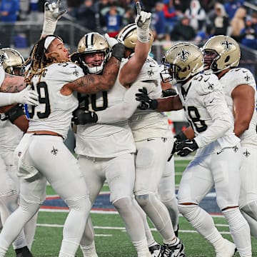 New Orleans Saints special teams celebrate after defensive tackle Bryan Bresee (90) blocks against New York Giants field goal 