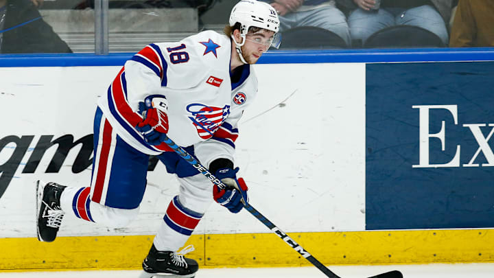 Isak Rosen (#18) skating for the Rochester Americans