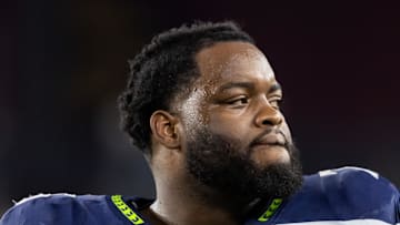 Seattle Seahawks guard Anthony Bradford looks on