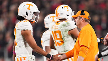 Tennessee head coach Josh Heupel and Tennessee quarterback Nico Iamaleava (8) during a college football game between Tennessee and Georgia at Sanford Stadium in Athens, Ga., on Saturday, November 16, 2024.