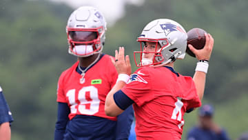 Jul 24, 2024; Foxborough, MA, USA;  New England Patriots quarterback Bailey Zappe (4) throws a pass during training camp at Gillette Stadium. Mandatory Credit: Eric Canha-USA TODAY Sports
