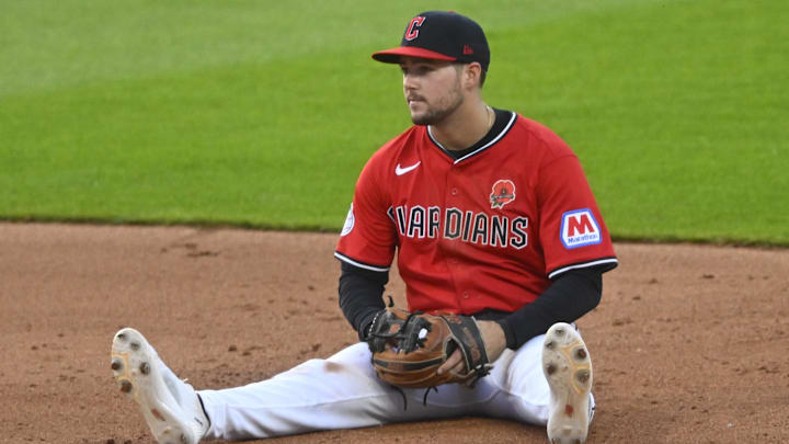 May 26, 2025: Cleveland Guardians second baseman Will Wilson (7) sits on the infield in the sixth inning against the Los Angeles Dodgers at Progressive Field. 