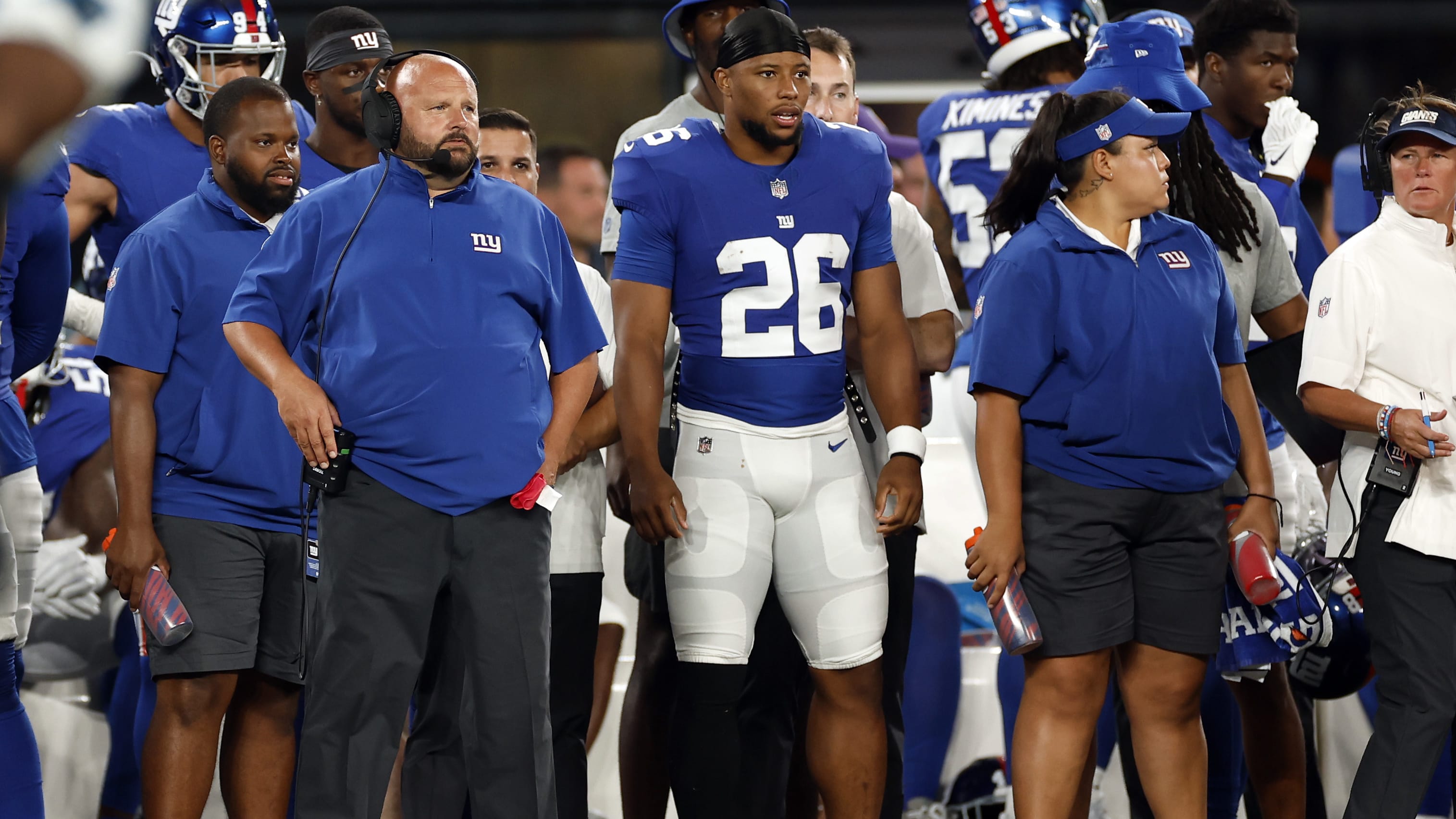 Giants head coach Brian Daboll and former running back Saquon Barkley.