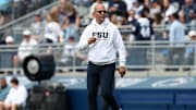 Penn State coach James Franklin walks on the field during the Blue-White Game at Beaver Stadium.