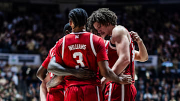 Nebraska basketball players, including Brice Williams and Braxton Meah, huddle at Purdue on Jan. 12, 2025.
