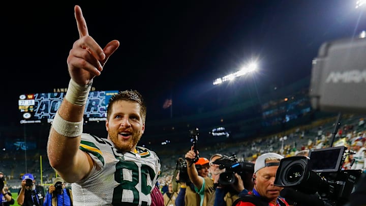 Green Bay Packers tight end Tucker Kraft (85) points to the crowd after last week's victory over the Commanders. Green Bay Packers tight end Tucker Kraft (85) points to the crowd after last week's victory over the Commanders.