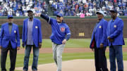 Apr 1, 2024; Chicago, Illinois, USA; L-R former Chicago Cubs Billy Williams, Lee Smith, Fergie Jenkins and Andre Dawson look on as Ryne Sandberg throws out the ceremonial first pitch before the game between the Chicago Cubs and the Colorado Rockies at Wrigley Field.