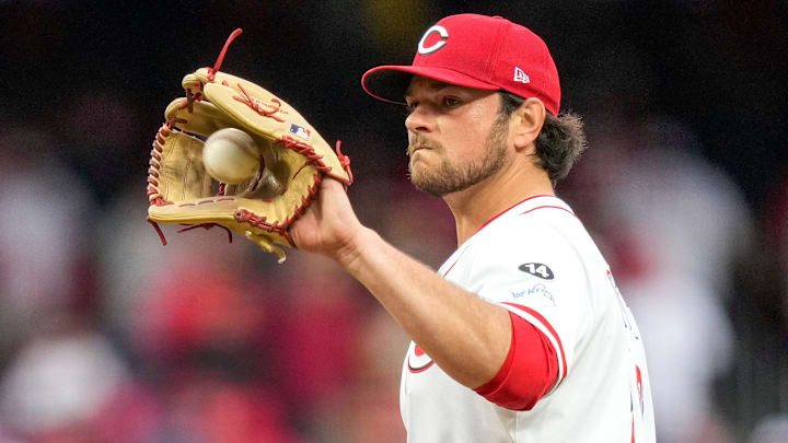 Cincinnati Reds pitcher Ian Gibaut (79) gets a new ball after giving up a go-ahead three-run home run