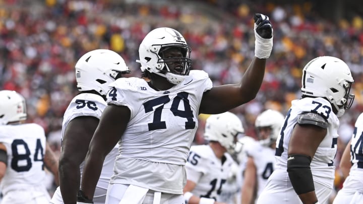 Nov 4, 2023; College Park, Maryland, USA;  Penn State Nittany Lions offensive lineman Olumuyiwa Fashanu (74) celebrates after a first half touchdown against the Maryland Terrapins at SECU Stadium. 