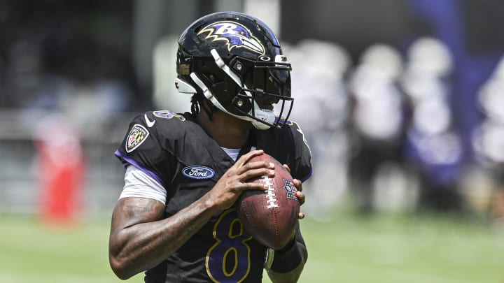 Jul 27, 2024; Owings Mill , MD, USA; Ravens quarterback Lamar Jackson (8) drops back to pass during the afternoon session of training camp at the Under Armour Performance Center,  Mandatory Credit: Tommy Gilligan-USA TODAY Sports