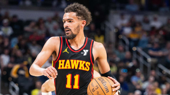 Apr 14, 2024; Indianapolis, Indiana, USA; Atlanta Hawks guard Trae Young (11) dribbles the ball in the second half against the Indiana Pacers at Gainbridge Fieldhouse. 