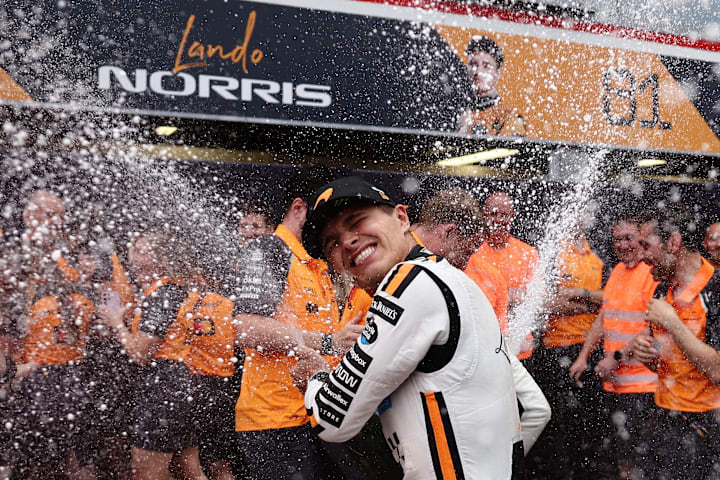 Lando Norris celebrates with his team after winning the F1 Monaco Grand Prix at Circuit de Monaco. 