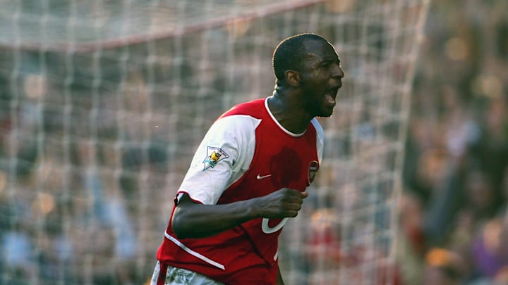 Patrick Vieira of Arsenal celebrates scoring the winning goal