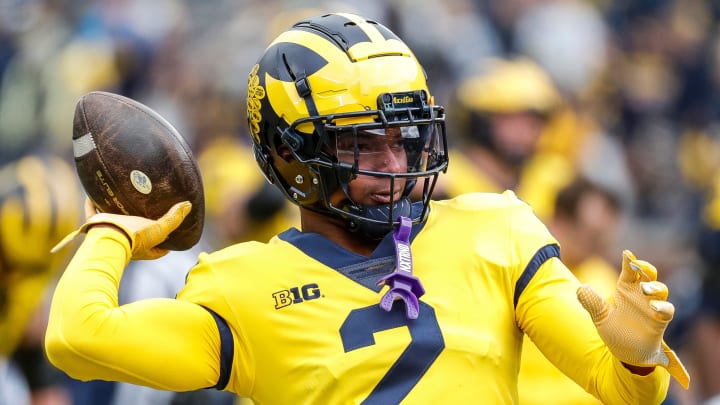 Maize Team defensive back Will Johnson (2) warms up during the spring game at Michigan Stadium in Ann Arbor on Saturday, April 20, 2024.