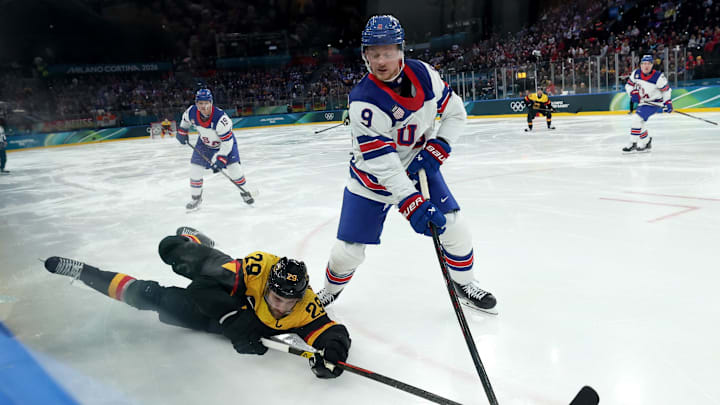 [US, Mexico & Canada customers only] Feb 15, 2026; Milan, Italy;  Jack Eichel of United States in action with Leon Draisaitl of Germany in men's ice hockey group A play during the Milano Cortina 2026 Olympic Winter Games at Milano Santagiulia Ice Hockey Arena. Mandatory Credit: Mike Segar/Reuters via Imagn Images