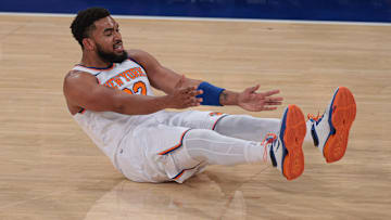 Oct 24, 2025; New York, New York, USA;  New York Knicks center Karl-Anthony Towns (32) reacts after being fouled  during the first quarter against the Boston Celtics at Madison Square Garden. Mandatory Credit: Vincent Carchietta-Imagn Images