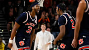 Auburn forward Chaney Johnson and guard Denver Jones celebrate during a recent game.