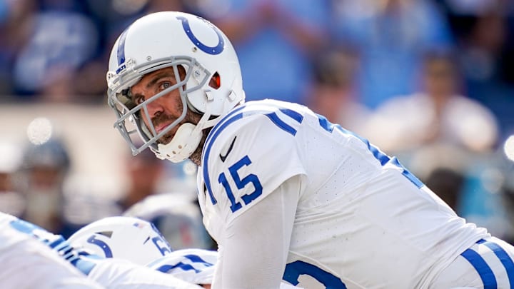 Indianapolis Colts quarterback Joe Flacco (15) gets in position against the Tennessee Titans during the fourth quarter at Nissan Stadium in Nashville, Tenn., Sunday, Oct. 13, 2024.