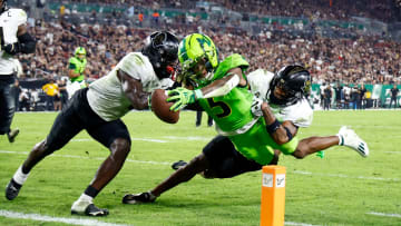 Nov 26, 2022; Tampa, Florida, USA; South Florida Bulls wide receiver Jimmy Horn Jr. (5) scores a two point conversion against the UCF Knights during the third quarter at Raymond James Stadium. Mandatory Credit: Douglas DeFelice-USA TODAY Sports