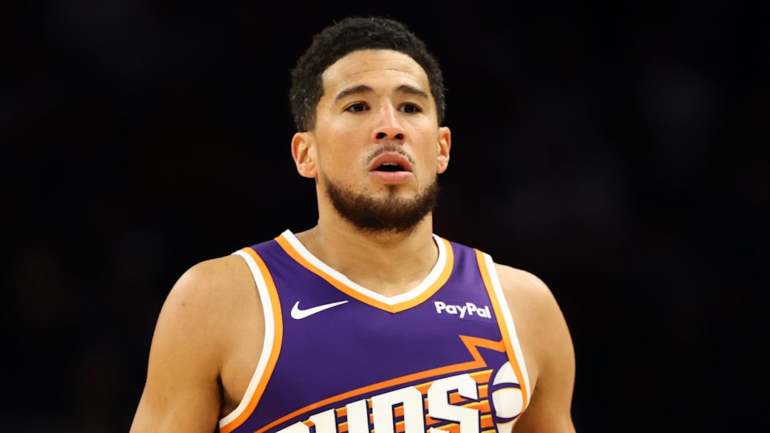 Nov 29, 2025; Phoenix, Arizona, USA; Phoenix Suns guard Devin Booker (1) against the Denver Nuggets at the Mortgage Matchup Center. Mandatory Credit: Mark J. Rebilas-Imagn Images Nov 29, 2025; Phoenix, Arizona, USA; Phoenix Suns guard Devin Booker (1) against the Denver Nuggets at the Mortgage Matchup Center. Mandatory Credit: Mark J. Rebilas-Imagn Images