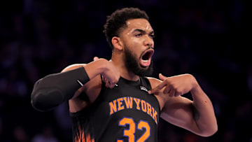 Nov 14, 2025; New York, New York, USA; New York Knicks center Karl-Anthony Towns (32) reacts during the first quarter against the Miami Heat at Madison Square Garden. Mandatory Credit: Brad Penner-Imagn Images