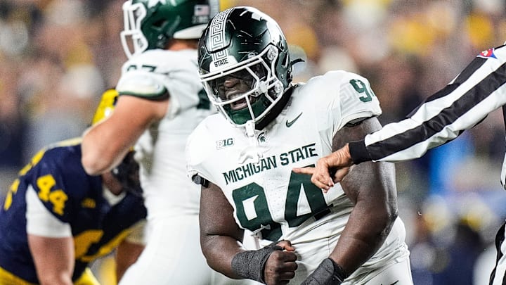 Michigan State defensive lineman D'Quan Douse (94) celebrates a tackle against Michigan during the first half at Michigan Stadium in Ann Arbor on Saturday, Oct. 26, 2024.