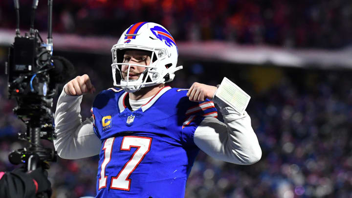 Jan 21, 2024; Orchard Park, New York, USA; Buffalo Bills quarterback Josh Allen (17) reacts after scoring a touchdown against the Kansas City Chiefs in the first half of the 2024 AFC divisional round game at Highmark Stadium. Mandatory Credit: Mark Konezny-USA TODAY Sports