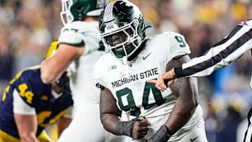 Michigan State defensive lineman D'Quan Douse (94) celebrates a tackle against Michigan during the first half at Michigan Stadium in Ann Arbor on Saturday, Oct. 26, 2024.