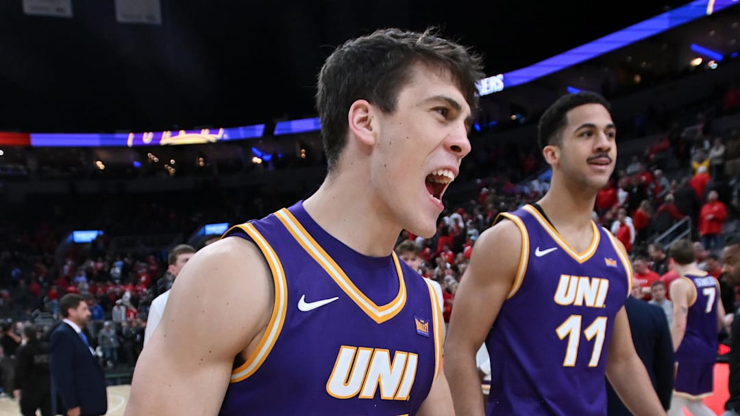 Mar 7, 2026; St. Louis, MO, USA;  Northern Iowa Panthers forward Tristan Smith (14) and Ismael Diouf (11) celebrate their 73-69 win over the Bradley Braves during the second half at Enterprise Center. Mandatory Credit: Ron Johnson-Imagn Images